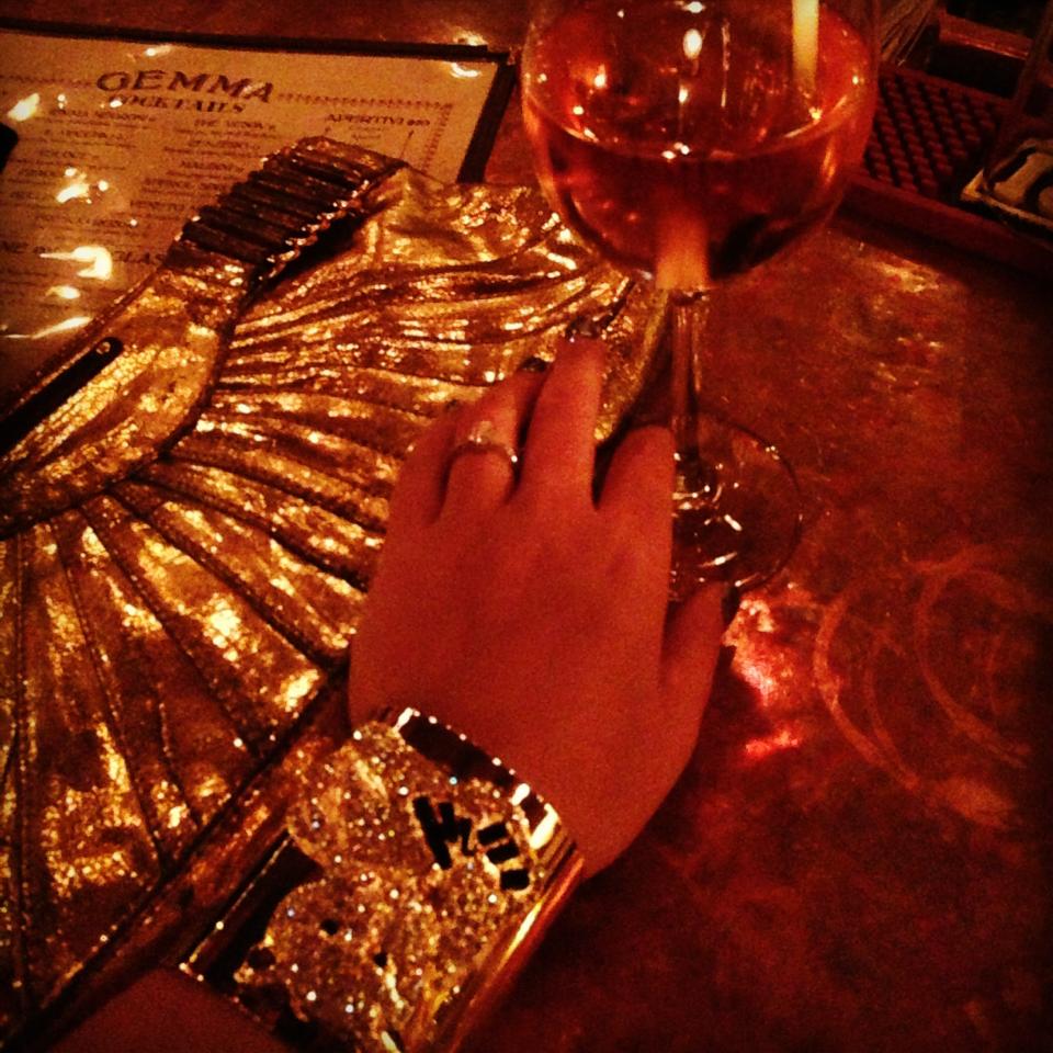 Luv accessorized with a banging Rebecca clutch and double Krizia lion cuffs. MEOW!