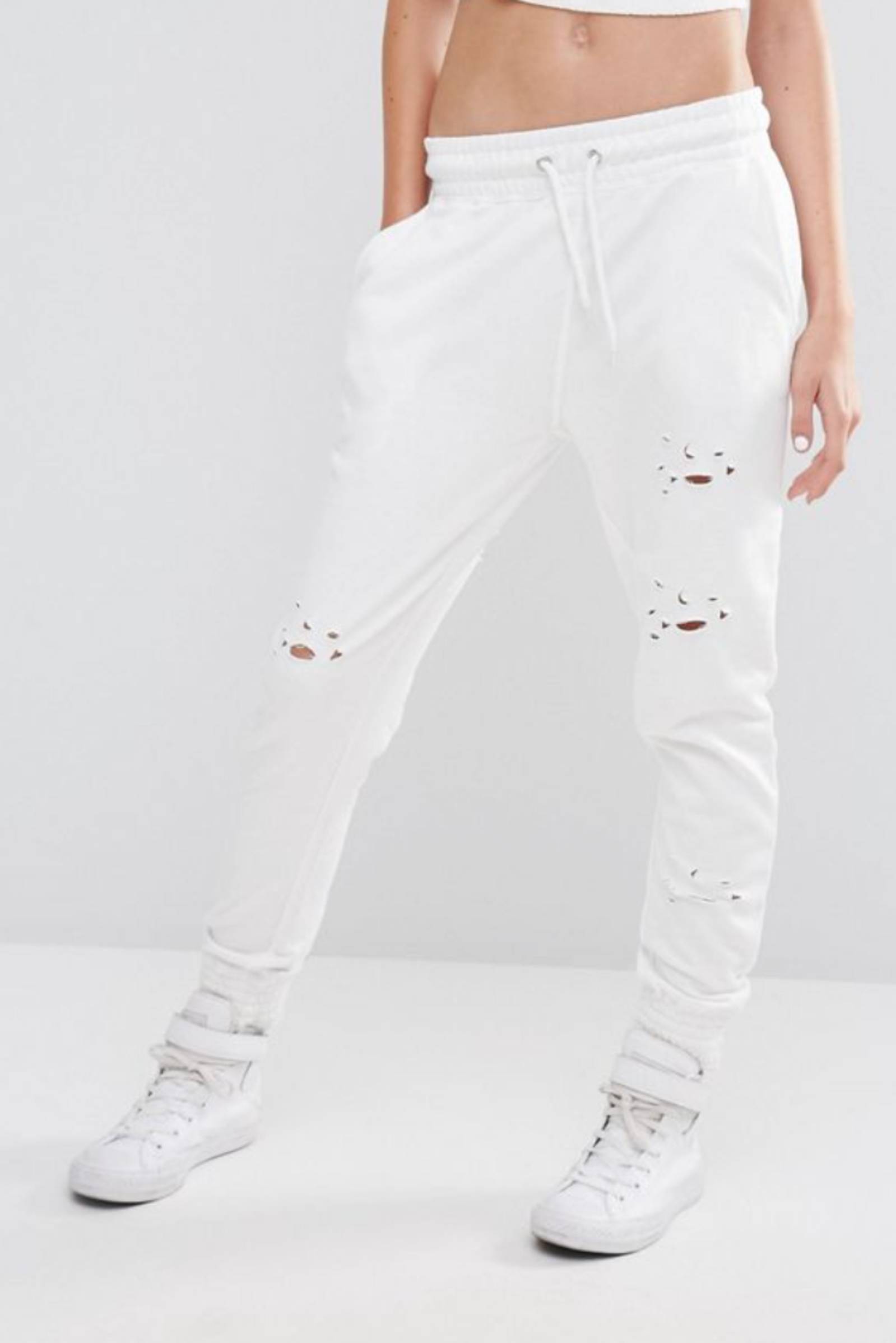 white ripped sweatpants